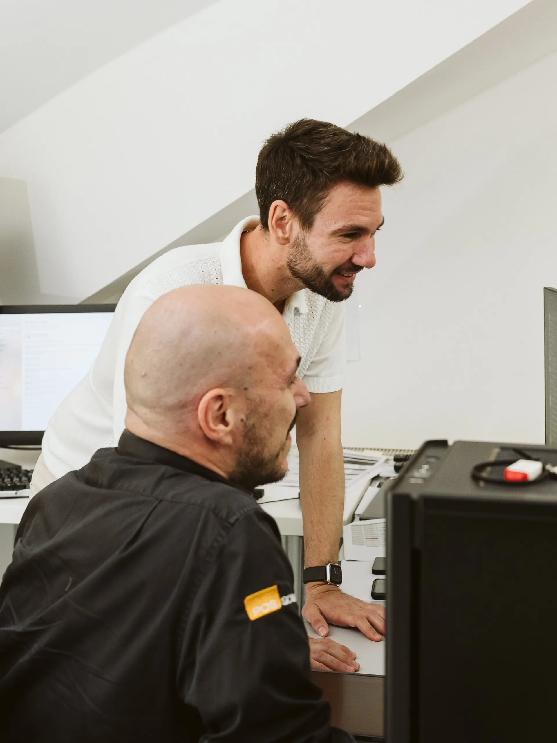 EMM Team am Computer